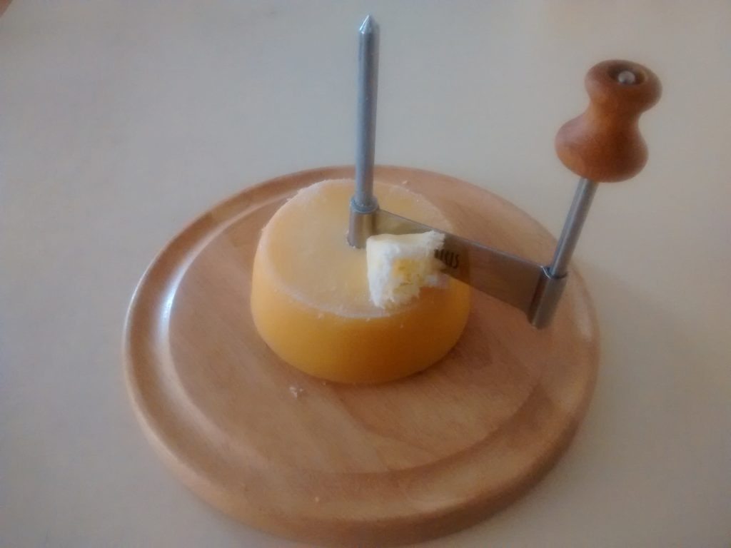 Girolle con queso ahumado.